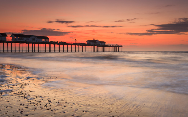 suffolk beach and pier at sunset