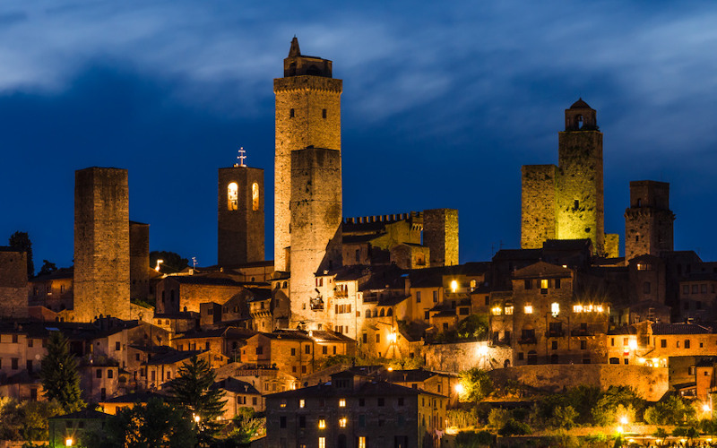 sunset on the tuscan hills of siena